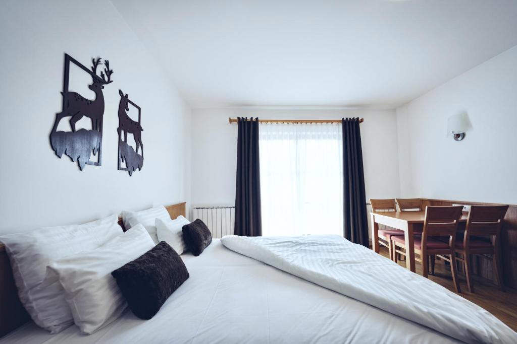 Pohorje Village Wellbeing Wellness Apartmen - Afbeelding 4